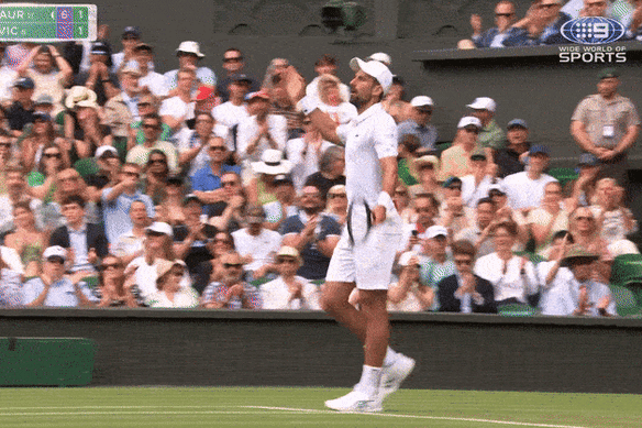 Key juncture: Novak Djokovic revs up the crowd.