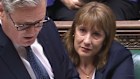 Chancellor of the Exchequer Rachel Reeves, right, sitting as Prime Minister Keir Starmer speaks in the House of Commons.