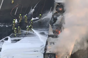 Firefighters battle a blaze on Melbourne’s Western Ring Road on Saturday after a truck burst into flames. 