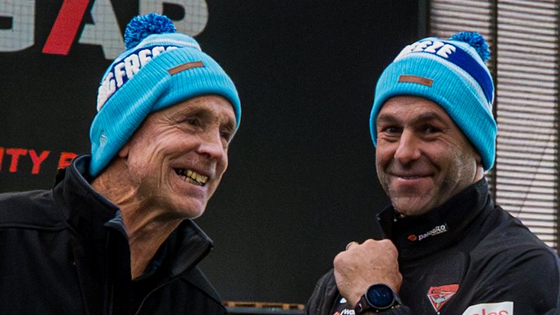 Terry Daniher urges Dons to ‘fight on’; Matthew Lloyd distances himself from Hird push