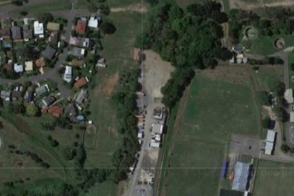 The extension of the Yeronga industrial land (centre), where unauthorised fill was identified by council chief executive Colin Jensen in 2011, appears to interrupt the tree-lined stream (top centre). Residents on the left say it is making flash flooding worse.