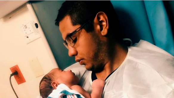 Andre Anchondo, who was killed on Saturday in the El Paso shooting, is pictured here with his newborn.