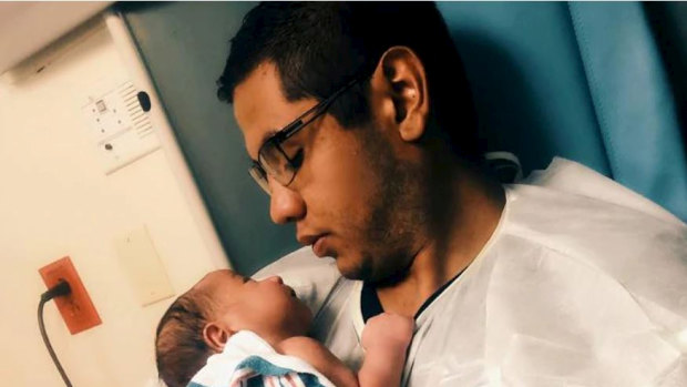 Andre Anchondo, who was killed on Saturday in the El Paso shooting, is pictured here with his newborn.