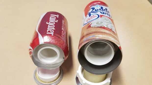 The soft drink can and whipped cream bottle found by police.