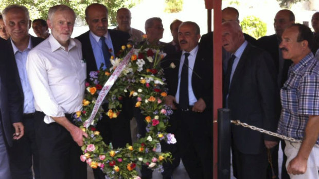 Jeremy Corbyn is shown at a wreath laying ceremony in a Tunisian graveyard that has led to accusations he was honouring terrorists.