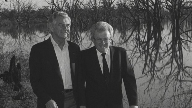 Bob Hawke and Graham Richardson walk among dead box trees at Disher Creek in Renmark South Australia.