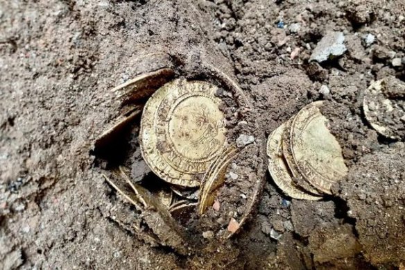 Home owners unearthed old coins during a kitchen renovation.