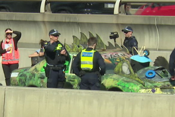 Police were called to reports of a car decorated to look like a reptile blocking traffic.