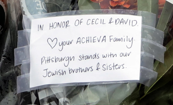 A note honours shooting victims Cecil and David Rosenthal.