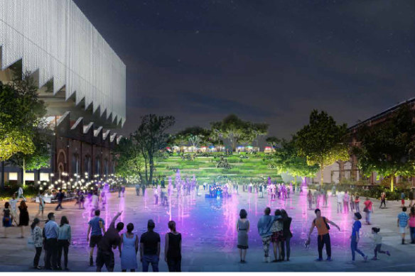 Renders by Make Architects of a creative precinct at North Eveleigh from 2017 show a sound studio on the left, the steps of a railway bridge in background and Carriageworks on the right. 