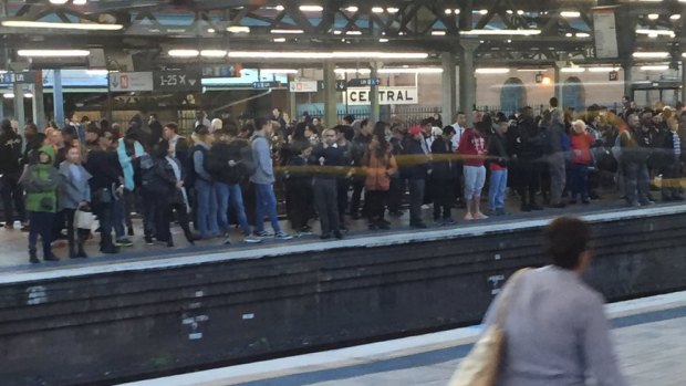 Commuters beginning to crowd a Central Station platform shortly after 4pm. 
