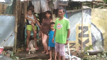 Jamaica Guanzon and her family, whose house in Kabankalan City was destroyed by typhoon Rai.