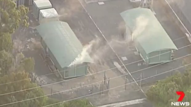 Smoke was seen rising from one of the buildings at Energex's Yatala substation.