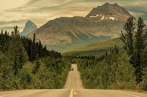 The road to the Canadian Rockies in the province of Alberta.