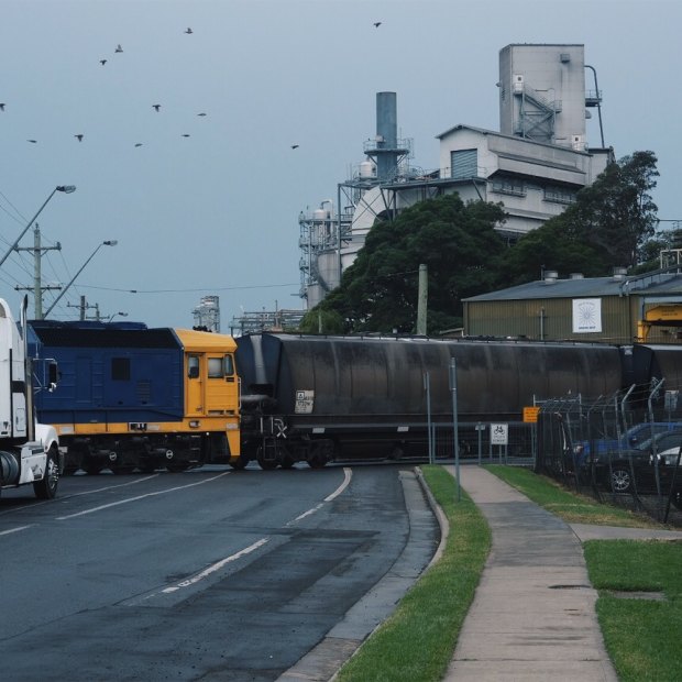 A freight train departs the Manildra mill in Bomaderry, one of the largest employers in the area.