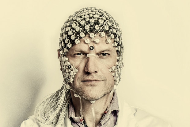 Neurologist Steven Laureys wearing an EEG, or electroencephalogram, used to test electrical activity in the brain.