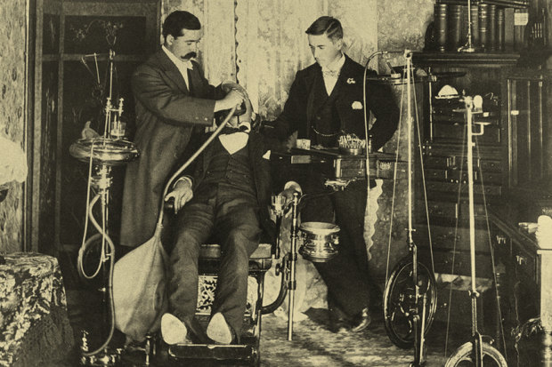 A dentist and his assistant prepare a patient in the country town of Colac in Victoria at the turn of last century.