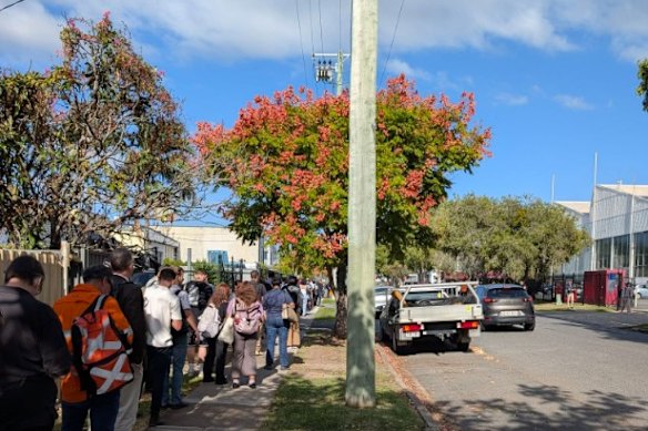 Northside commuters wait for replacement buses to continue their journey. 