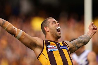Buddy’s flag with the Hawks in 2013.