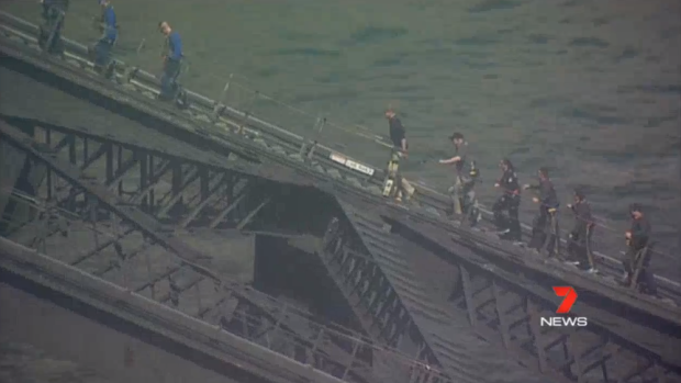 Prince Harry and Prime Minister Scott Morrison start their Sydney Harbour Bridge climb.