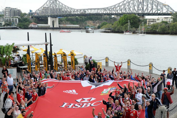 Fans surround a giant British and Irish Lions jersey on the Brisbane River ahead of a previous test against the Wallabies.