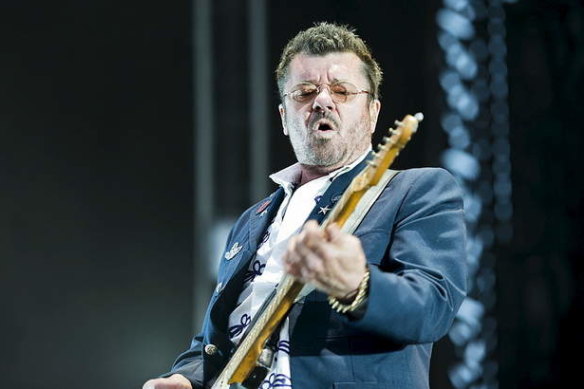 INXS' Tim Farriss performing in 2012.