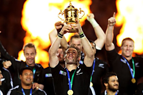 Richie McCaw lifts the William Webb Ellis Cup after the All Blacks’ win in the 2011 Rugby World Cup final.