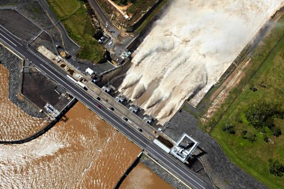 Wivenhoe Dam spilling water during the 2011 flood – with the Brisbane Valley Highway passing above.