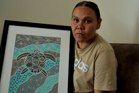 Cleveland Dodd’s mother, Nadene, with the last piece of artwork he produced in Unit 18. 