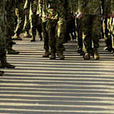 Army captain jailed for raping colleague with beer bottle