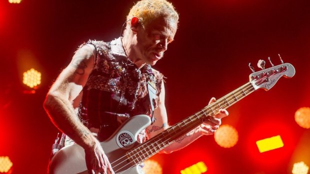 Bassist Flea hasn't lost any energy and still slaps the bass just as hard.