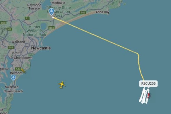 A rescue helicopter searches off the coast of Newcastle.