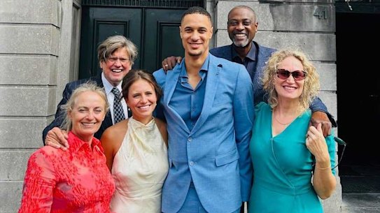 Melbourne United centre Jesse Edwards and his wife Quirine Edwards-Comans, middle, with their families after their wedding this year.