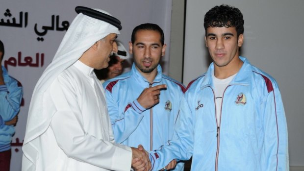 Hakeem al-Araibi (right) with AFC president Shiekh Salman, a member of the royal family who Araibi has been critical of in the past.