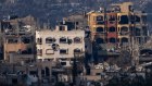 Destroyed buildings by Israeli bombardments as seen inside the Gaza Strip from southern Israel.