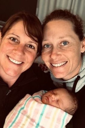 Sam Stosur (right) with partner, Liz, and their daughter, Evie, in 2020.