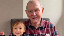 Farnham smiled alongside his grandson for a birthday snap.