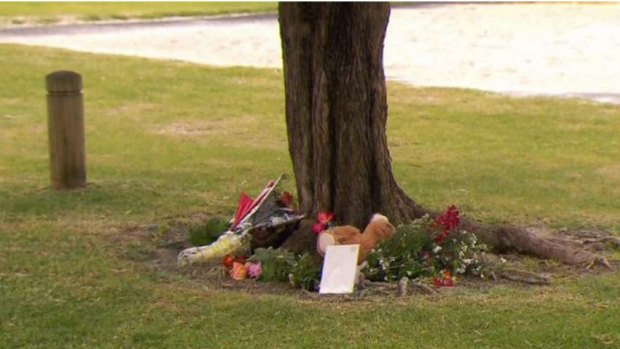 Families laid flowers at the crash scene in Maddington.