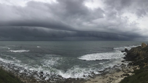 The storm approaches the coast at Cottesloe.