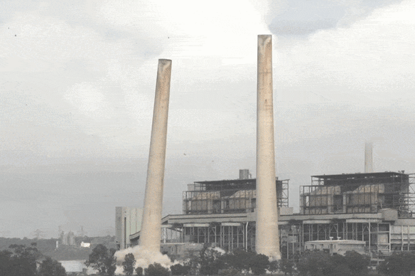 The Liddell Power Station chimney stacks being demolished today.