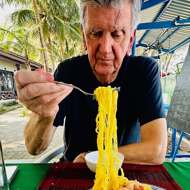Restaurant critic Terry Durack getting his slurp on at the Khu Nghi Duong Lang Co Beach Resort in Hue, Vietnam.