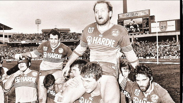 Ray Price and Mick Cronin are chaired off after winning the 1986 grand final.