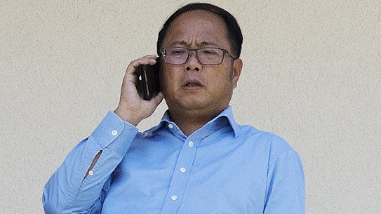 Huang Xiangmo on the balcony of his former Mosman home.