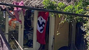 The NSW government is looking to ban Nazi flags after a swastika was flown on a Newtown house at the weekend. 