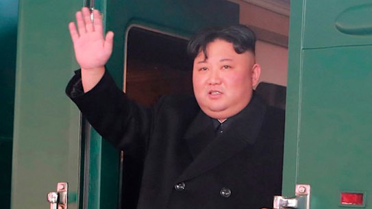 The North Korean dictator Kim Jong-un pictured boarding the train bound for Hanoi from Pyongyang Station in North Korea on Sunday.