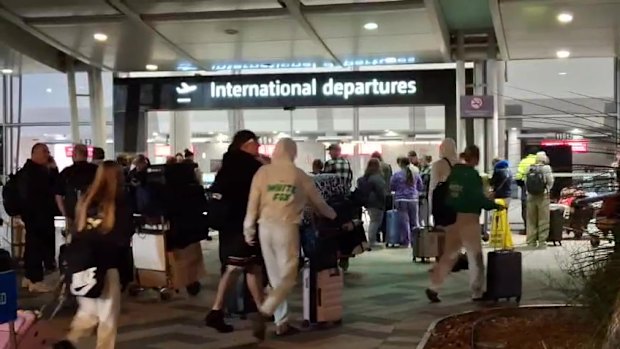 Perth Airport was evacuated early on Friday morning by a fire alarm, forcing passengers to wait outside in the cold. Picture: 9News Perth