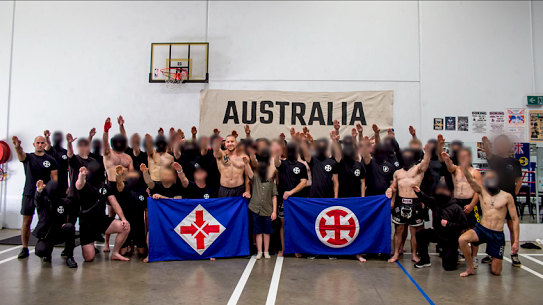 Assembled right-wing activists pose at Legacy Boxing Gym, in Sunshine West.