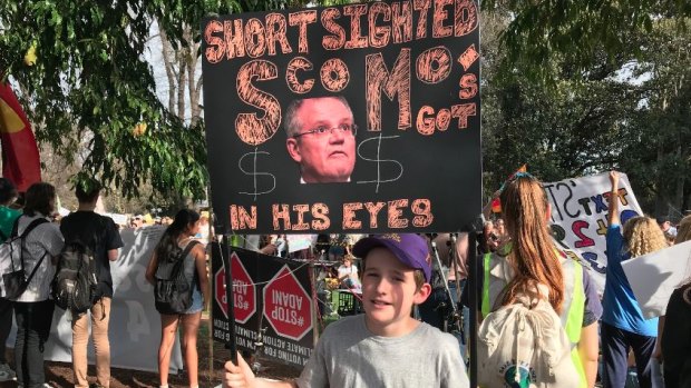 Arlo Scott-Tunen, 10, at Melbourne's protest.