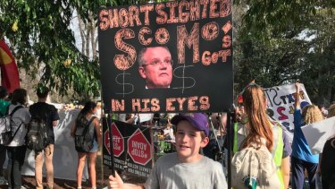 Arlo Scott-Tunen, 10, at Melbourne's protest.