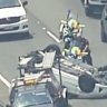 'Armed carjackers' charged after flipping car on Bruce Highway